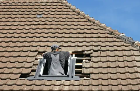 Pose de velux - Pourrain